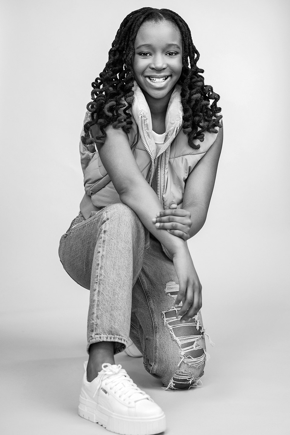 Owethu Dube smiling black-and-white portrait